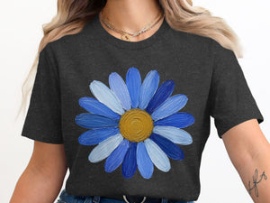Dark grey t-shirt with a bold, textured blue daisy graphic on the chest.