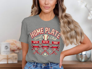 Home Plate Social Club graphic on gray t-shirt with baseball, chairs, and text.