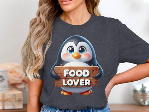 Cartoon penguin holding a wooden sign that says "FOOD LOVER".