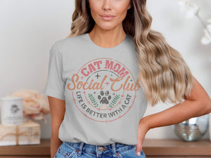 Light grey t-shirt with "Cat Mom Social Club Life is Better With a Cat" graphic.