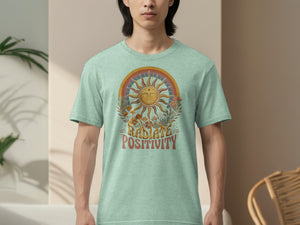 T-shirt with sun and rainbow graphic and text "RADIATE POSITIVITY."