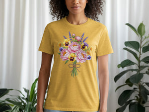 Yellow t-shirt with colorful floral bouquet graphic on the front.