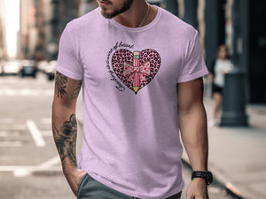 Pink t-shirt with heart graphic featuring a leopard print, pencil, and bow.
