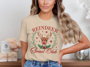 T-shirt with a watercolor reindeer graphic and "Reindeer Social Club" text.