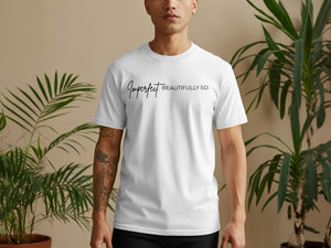 White t-shirt with black cursive text reading "Imperfect BEAUTIFULLY SO."