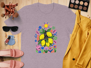 Lilac t-shirt with a whimsical lemon branch and floral print design.