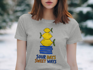 Grey t-shirt with stacked lemons design and text "Sour Days Sweet Ways."