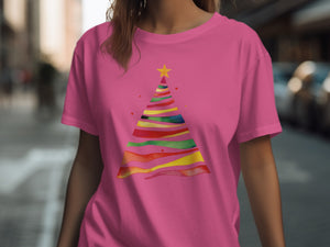 Pink t-shirt with a colorful abstract Christmas tree graphic.