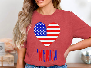 A woman wearing a red t-shirt with an American flag heart graphic and 'MERICA text.