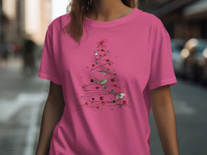 Pink t-shirt with a stylized Christmas tree design featuring ornaments and holly.