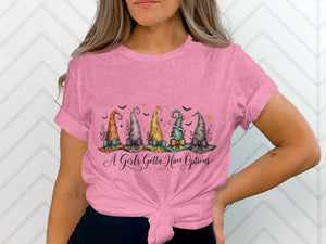 Pink t-shirt with five witch hats and text "A Girls Gotta Have Options."