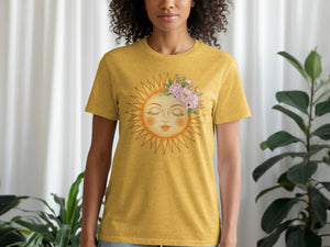 Yellow t-shirt with a sun graphic adorned with a floral crown.