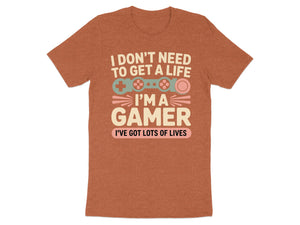 Orange t-shirt with text "I DON'T NEED TO GET A LIFE I'M A GAMER I'VE GOT LOTS OF LIVES".