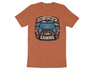 Orange t-shirt with "Don't Disturb Me I'm Gaming" graphic featuring a controller.