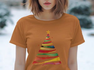 Orange t-shirt with a colorful abstract Christmas tree and star design.