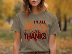 In all things give thanks text with pumpkins and arrow graphic.