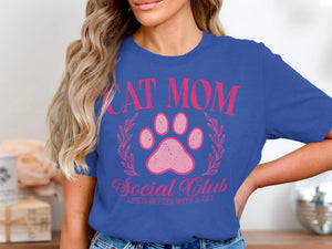 Blue t-shirt with "Cat Mom Social Club Life is Better With A Cat" text.