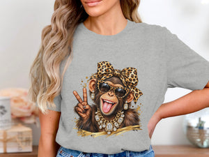Chimpanzee wearing leopard print bow, sunglasses, and jewelry making peace sign.