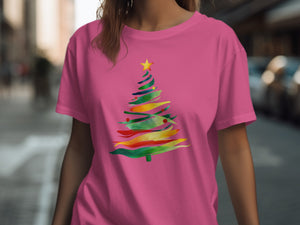 Pink t-shirt with a colorful abstract Christmas tree graphic.