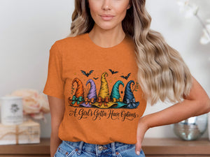Orange t-shirt with five colorful witch hats and bats. "A Girl's Gotta Have Options" text.