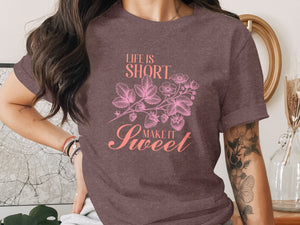 T-shirt with "Life is SHORT Make it Sweet" text and strawberry floral design.