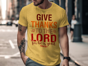 Yellow t-shirt with text "GIVE THANKS TO THE LORD for he is good PSALM 107:1".