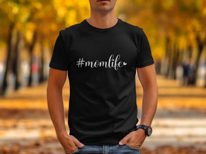 Black t-shirt with "#momlife" in white script font and a heart accent.