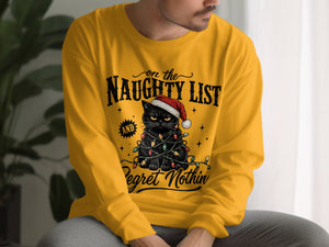 A man wearing a yellow long-sleeve t-shirt featuring a graphic of a black cat with Christmas lights and text.