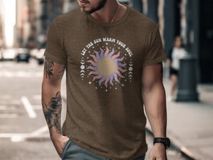 Brown t-shirt with sun graphic and "LET THE SUN WARM YOUR SOUL" text.