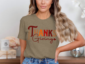 Thanksgiving graphic tee with text that reads "Happy Thanksgiving".