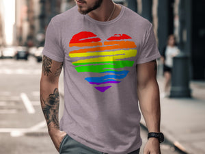 Man wearing grey t-shirt with rainbow heart graphic
