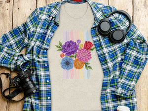 Light beige t-shirt with colorful floral design and pastel brush strokes.