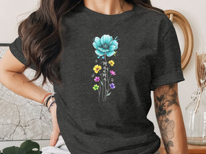 Dark grey t-shirt with a watercolor blue flower and "mama" text in colorful small flowers.