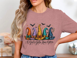 Five colorful witch hats with bows and bats above, text reads "A Girl's Gotta Have Options".
