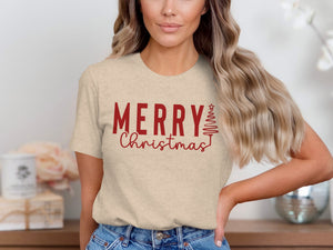 Tan t-shirt with red "Merry Christmas" text and a Christmas tree graphic.