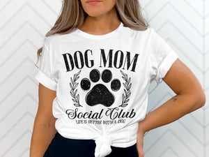 White t-shirt with "DOG MOM Social Club" and a paw print.