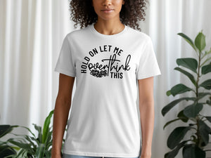 White t-shirt with black text that says "hold on let me overthink this".