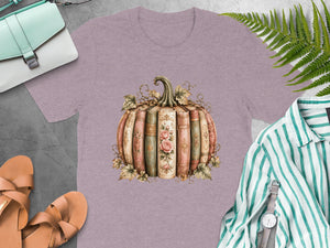 Lilac t-shirt with an illustrated pumpkin made of vintage books with floral details.