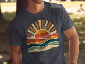 Dark gray t-shirt with a retro sunset graphic featuring colorful wavy stripes.
