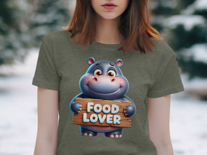 Cartoon hippo holding a wooden sign that says "Food Lover".