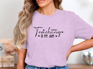Light purple t-shirt with black text that reads "Teaching is my jam".