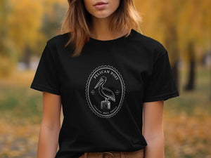 Black t-shirt with white Pelican Post Coastal Mail Service logo and 1987