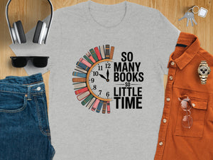 Grey t-shirt featuring a clock made of books and text "So Many Books So Little Time"