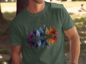 T-shirt with a watercolor-style graphic of rainbow trees reflected in water.