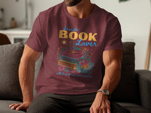 Maroon t-shirt with "Seaside Book Lover" text over stacked books and a beach scene.