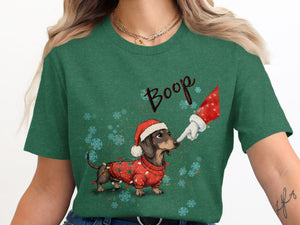 Dachshund in Santa hat and Christmas sweater with lights and snowflakes, "Boop" text.