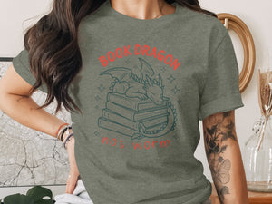 Green t-shirt with "BOOK DRAGON" and dragon sleeping on books graphic.