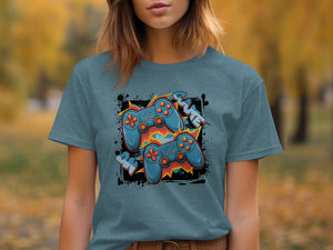 Blue t-shirt with cartoon gaming controllers and the word "GAME" graphic.