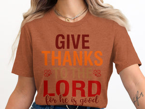 Brown t-shirt with text "GIVE THANKS TO THE LORD for he is good".