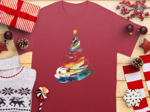 Red t-shirt with a colorful watercolor Christmas tree design and a yellow star.